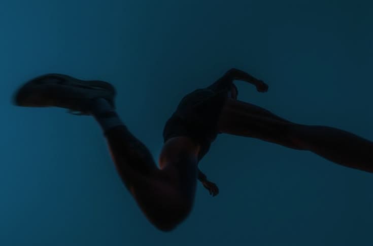 Runner's legs mid-stride